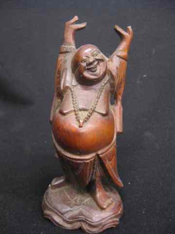 Appraisal: Chinese Carved Wooden Figure of a Buddha hands raised over