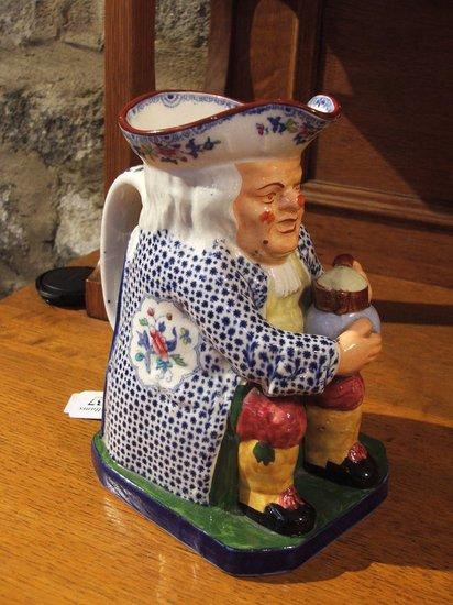 Appraisal: A COPELAND LATE SPODE POTTERY TOBY JUG the seated figure