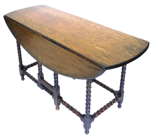 Appraisal: An thC style oak gateleg drop leaf table the D