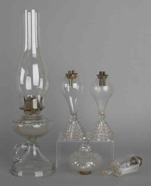 Appraisal: Three clear glass oil lamps th c together with two