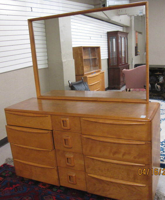 Appraisal: MID-CENTURY MODERN MAPLE TRIPLE DRESSER WITH MIRROR Heywood-Wakefield Furniture Co