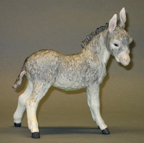 Appraisal: Cybis porcelain Mr Fitzgerald burro h together with a Cybis