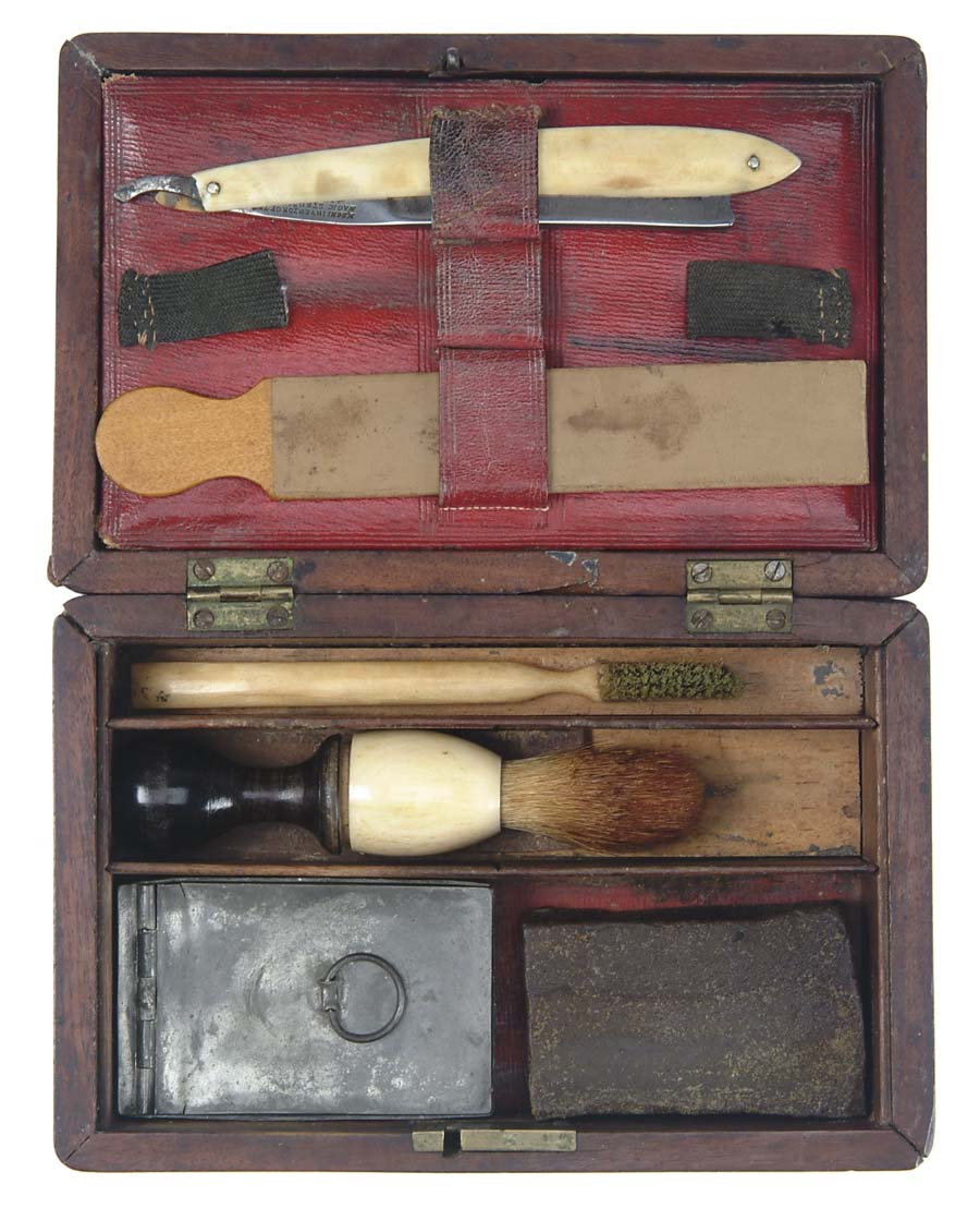 Appraisal: CIVIL WAR ERA GENTLEMAN S TRAVELING TOILETRY SET Hinged wood