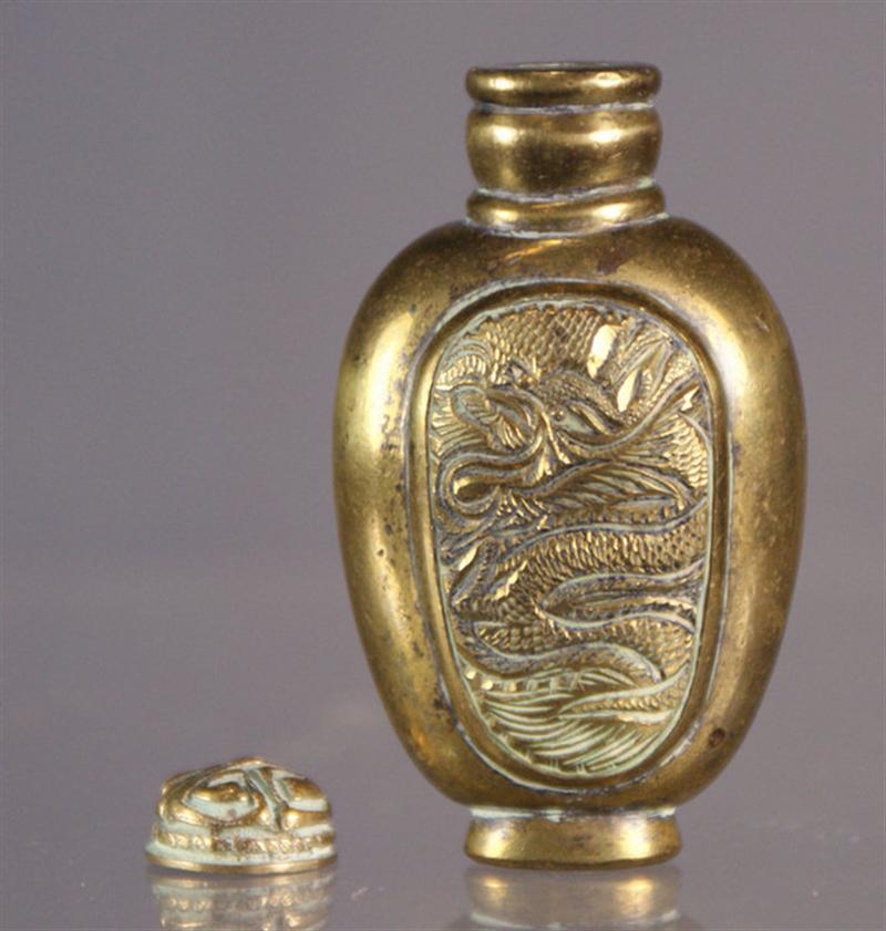 Appraisal: brass snuff bottle carved dragon design brass stopper h th