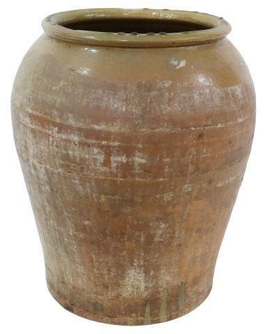 Appraisal: Large French glazed earthenware jar having flared rim short neck