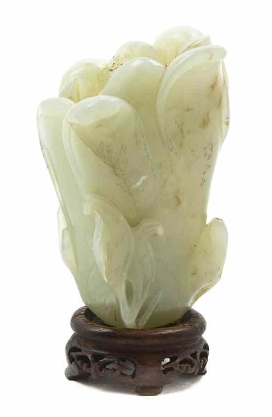 Appraisal: A Celadon Jade Floriform Vase of pale celadon colored stone