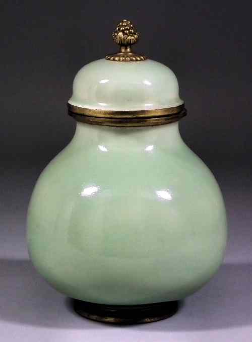 Appraisal: A Chinese celadon porcelain and gilt brass mounted baluster shaped