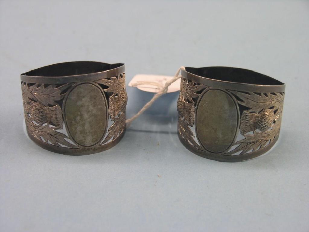 Appraisal: A pair of Scottish silver napkin rings each pierced and