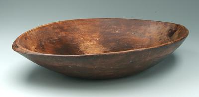 Appraisal: Carved oval wooden bowl carved of one piece undetermined wood