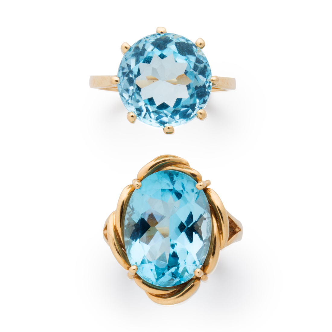 Appraisal: A GROUP OF BLUE TOPAZ AND FOURTEEN KARAT GOLD RINGS