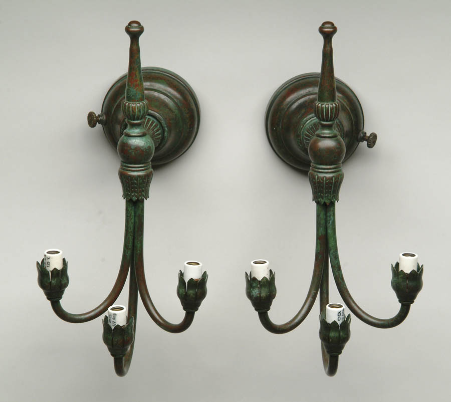 Appraisal: PAIR OF TIFFANY WALL LILY SCONCES Lovely three-branch form with