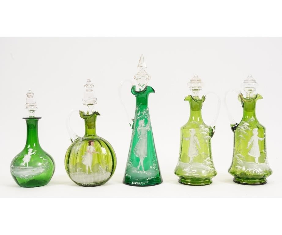 Appraisal: Pair of green Mary Gregory glass decanters together with three