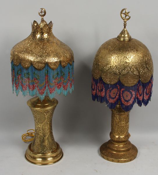 Appraisal: Pair of Indian open work brass lamps with beaded fringe