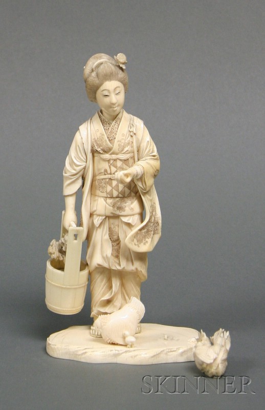 Appraisal: Ivory Carving Japan late th century woman tending chickens signed