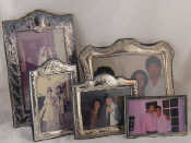 Appraisal: Five various modern silver photo frames