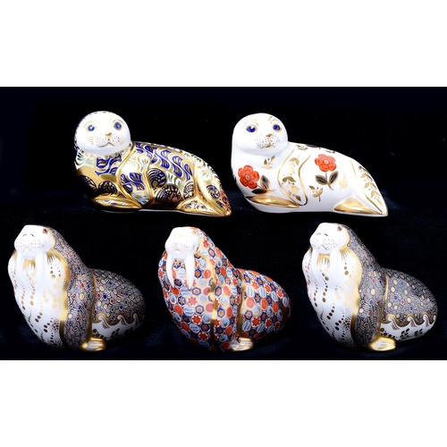 Appraisal: Five Royal Crown Derby Walrus and Seal paperweights Russian Walrus