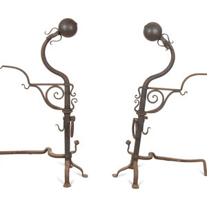 Appraisal: A Pair of Continental Iron Large Andirons TH CENTURY Height