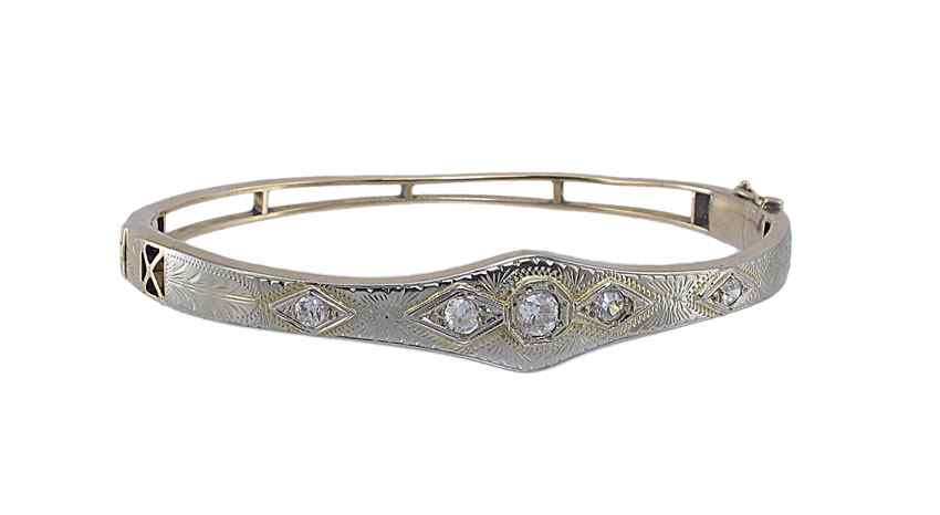 Appraisal: K GOLD DIAMOND BANGLE BRACELET K yellow gold hinged etched