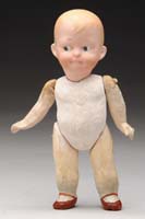 Appraisal: ERNST HEUBACH CHARACTER CHILD A whimsical little fellow with side