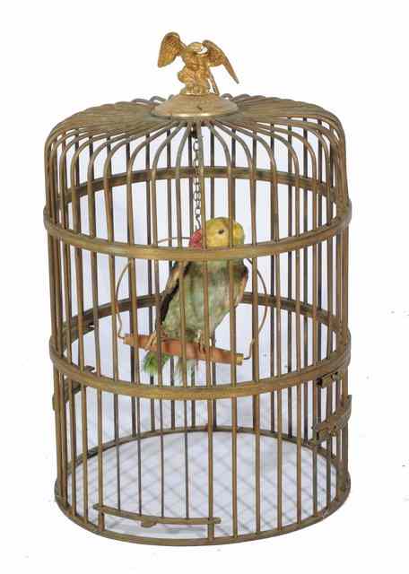 Appraisal: A BRASS BIRD CAGE with eagle finial together with a