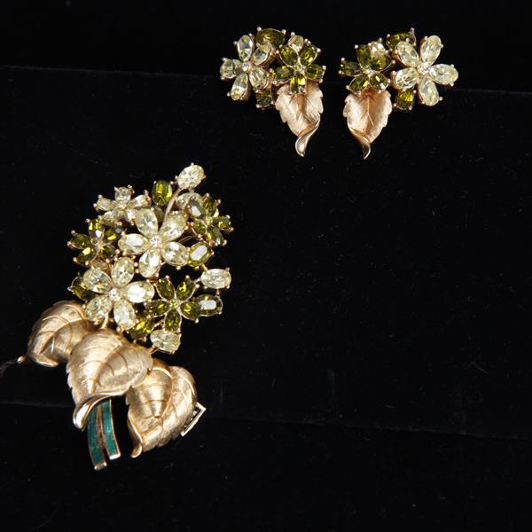 Appraisal: Trifari green jeweled garden bouquet brooch and earrings H x