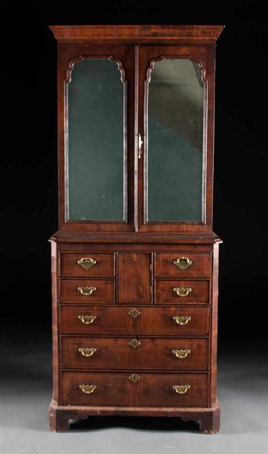 Appraisal: George II banded walnut mirrored top cabinet mid- th century