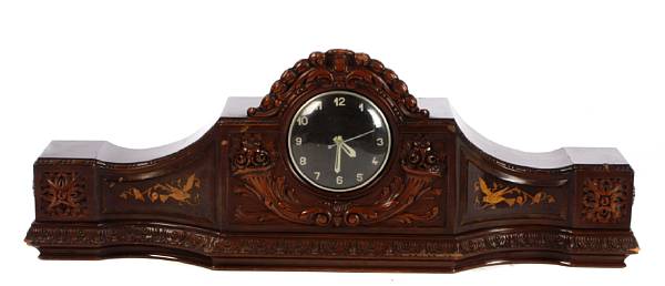 Appraisal: A carved mahogany and marquetry inlaid mantel clock height in