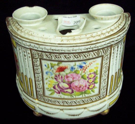 Appraisal: A half round crocus pot probably Derby painted bouquets of