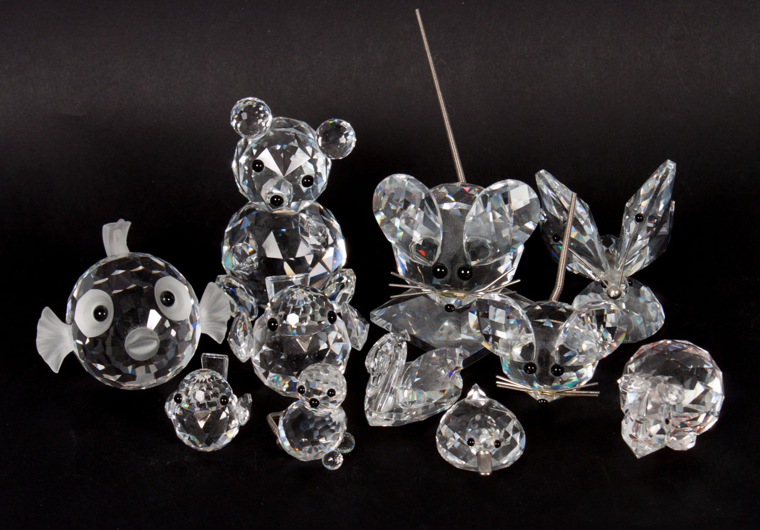 Appraisal: Swarovski crystal animals including teddy bear two mice butterfly puffer