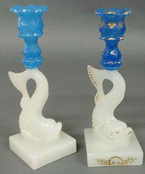 Appraisal: Two similar Sandwich glass dolphin-form candlesticks mid th c one