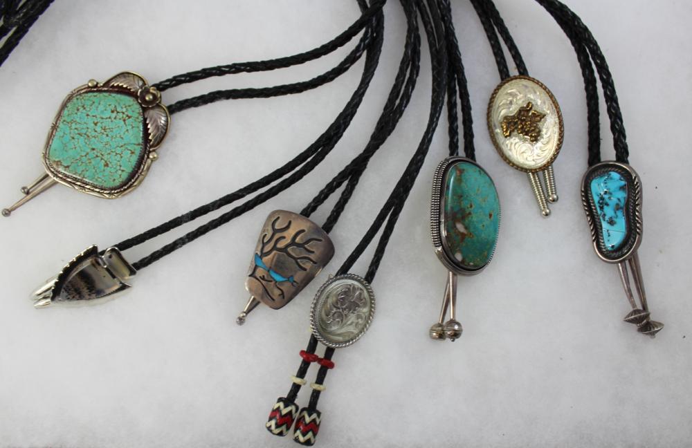 Appraisal: SEVEN WESTERN AND SOUTHWESTERN SILVER BOLO TIES three Navajo turquoise