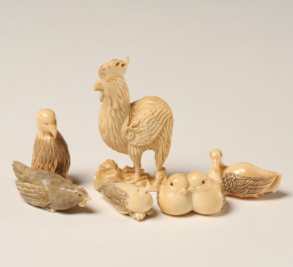 Appraisal: Japanese carved ivory netsukes bird figurines including some ivory Tallest