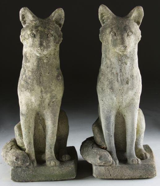 Appraisal: Pair of Vintage Concrete Foxes with bushy tails and attractive