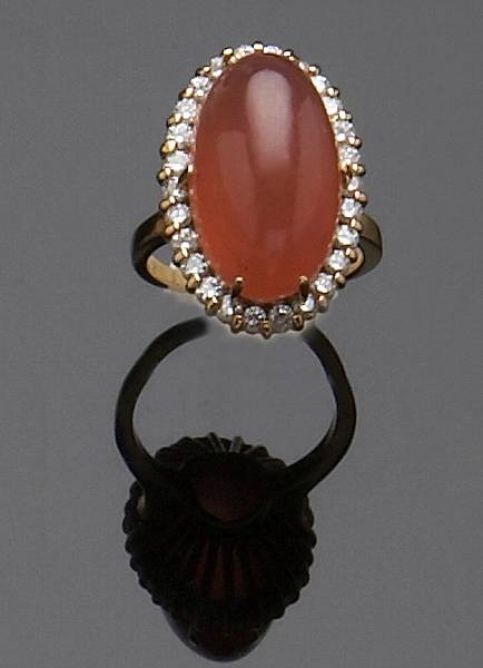 Appraisal: A pink thulite diamond and gold ring estimated total diamond