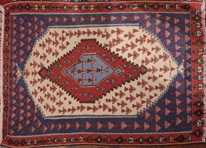 Appraisal: CAUCASIAN KILIM RUG AND INDO-TEKKE BURGUNDY-GROUND RUNNER ft in x