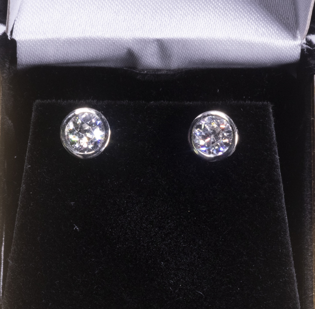 Appraisal: PAIR OF K WHITE GOLD DIAMOND EARRINGS Fancy bezel set