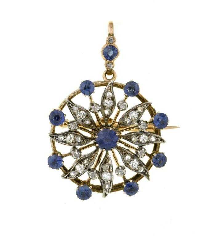 Appraisal: A SAPPHIRE AND DIAMOND PENDANT IN THE FORM OF A