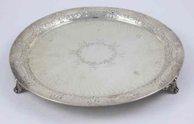 Appraisal: A circular silver salver Henry Stratford Sheffield with embossed swags