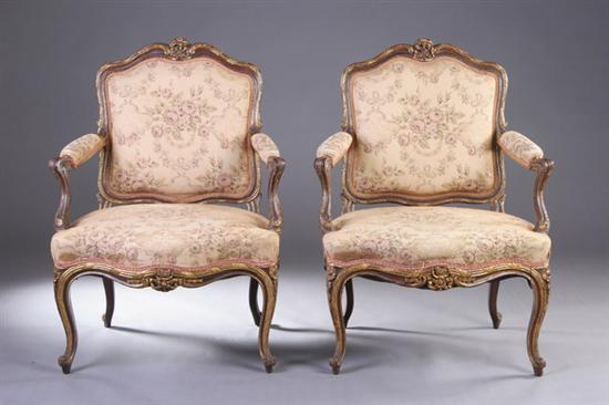 Appraisal: PAIR LOUIS XV STYLE PARCEL-GILT FAUTEUILS late th early th