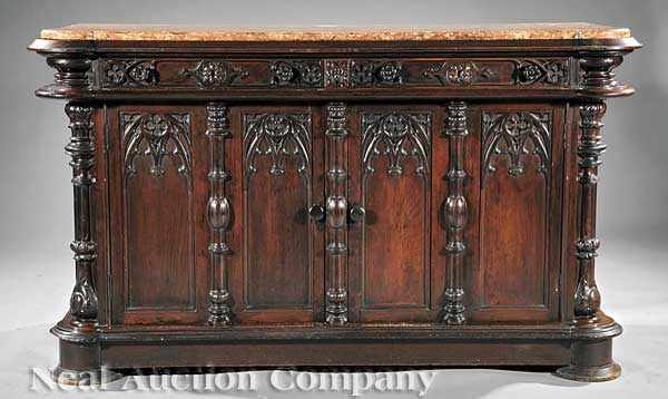 Appraisal: An American Gothic Carved Walnut Sideboard th c Philadelphia or