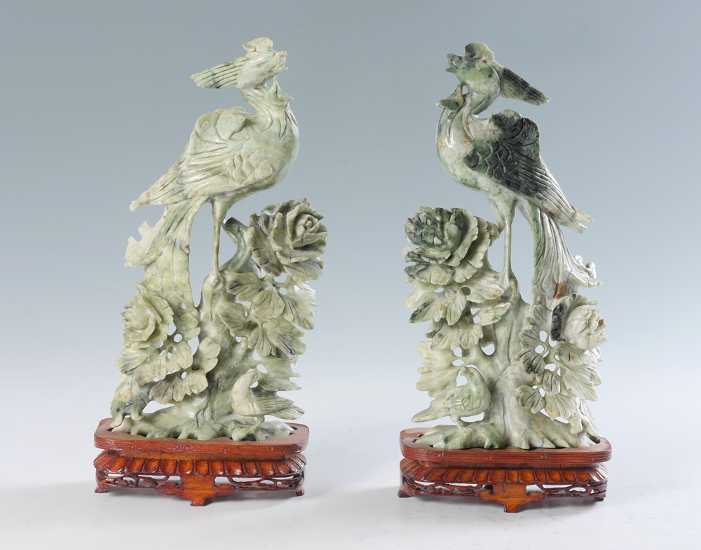 Appraisal: PAIR CHINESE CARVED STONE FIGURAL BIRDS Mirror image pair of