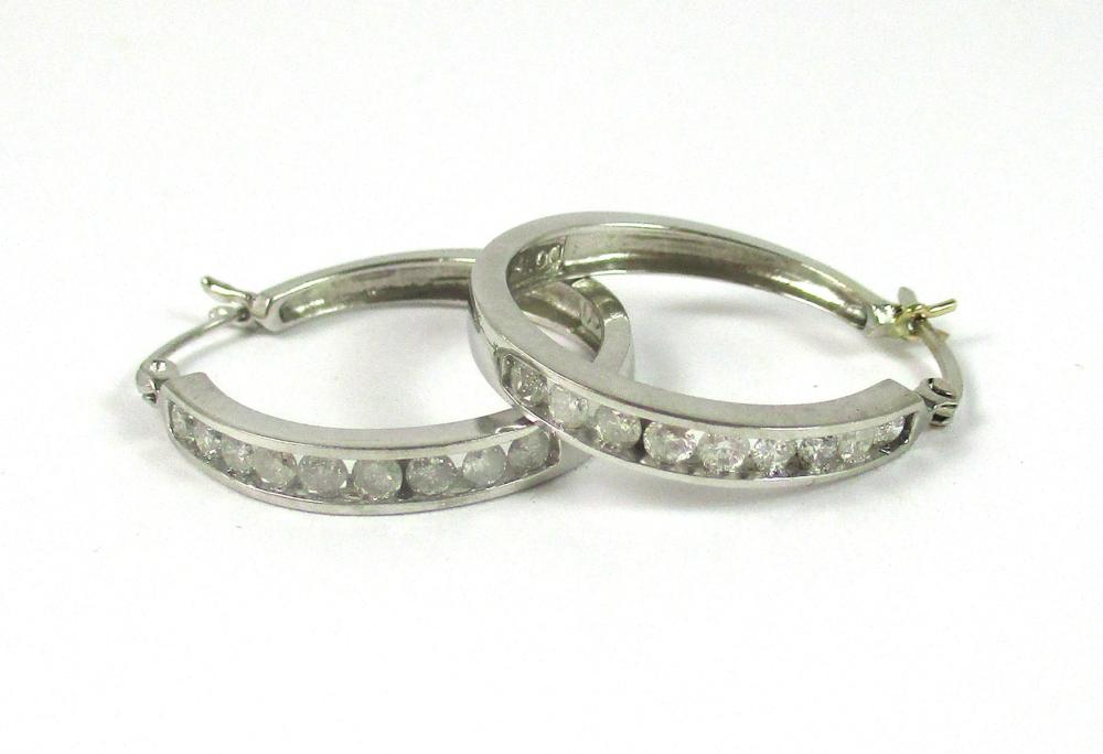 Appraisal: PAIR OF DIAMOND AND WHITE GOLD HOOP EARRINGS each k