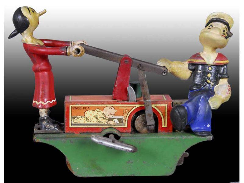 Appraisal: Marx Popeye Olive Oyl Wind-Up Hand Car Toy Description ''