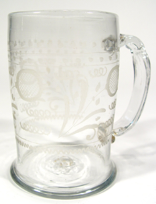 Appraisal: th Century style cylindrical glass tankard with wheel engraved floral