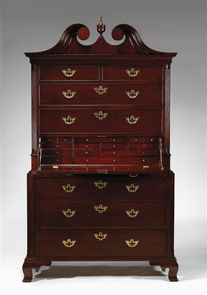 Appraisal: Mahogany chest-on-chest possibly american The upper section with an arched