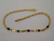 Appraisal: A carat gold collar of Greek Key design set along