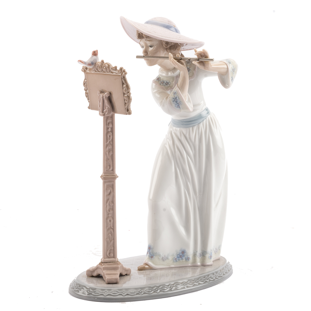 Appraisal: Lladro Song Bird porcelain group in H Condition Good condition