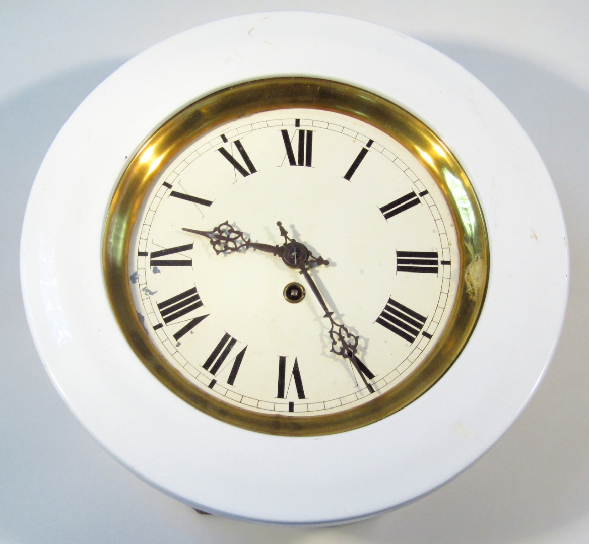 Appraisal: A thC style pine cased wall clock the cm Roman