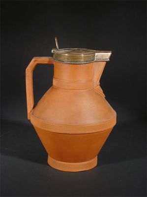 Appraisal: A Watcombe Torquay terracotta jug designed by Dr Christopher Dresser