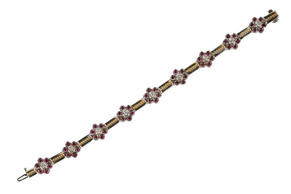 Appraisal: KARAT GOLD DIAMOND RUBY FLORAL BRACELETcontaining nine full cut diamonds